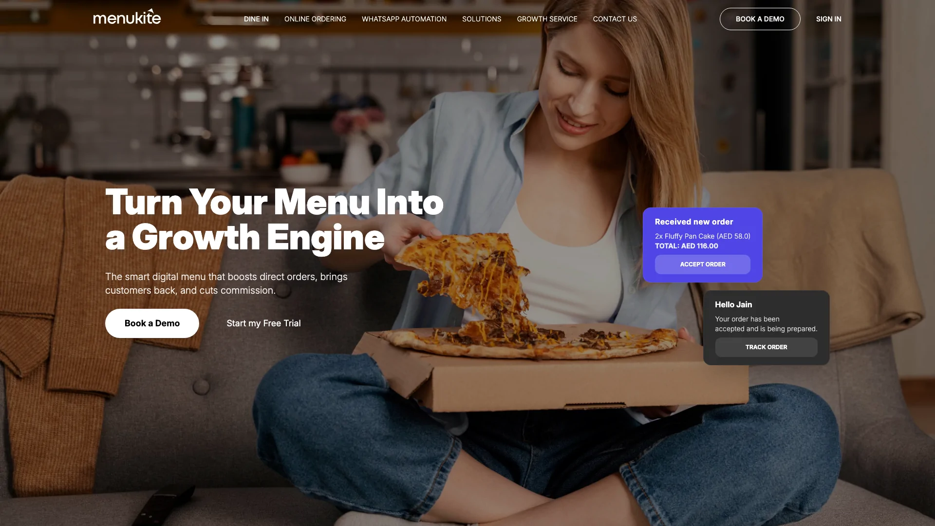 The Menukite homepage, with its headline over a customer ordering at home